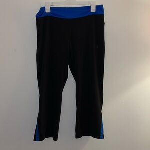 Adidas black wide-leg capri leggings with blue accents